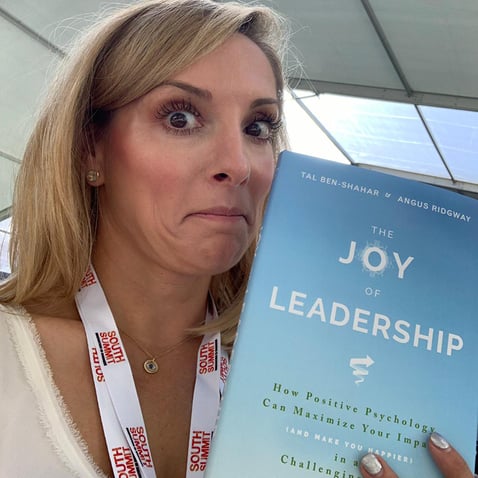 English for Fun Founder Jill Stribling, Educational Influencer Life for Fun, testing out the book The Joy of Leadership by Tal Ben-Shahar